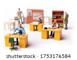 Miniature businesspeople team at the office. Macro shot of Tiny people business concept. Shallow Dept Of Field
