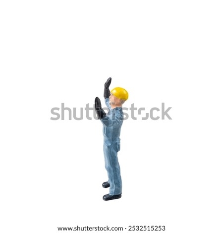 Miniature construction worker  isolate on white background with clipping path