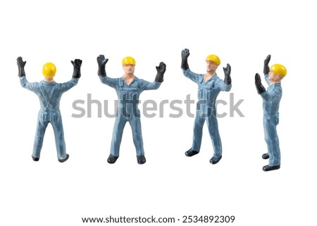 Miniature construction worker  isolate on white background with clipping path