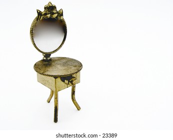 Miniature desk with mirror, brass desk isolated on white background