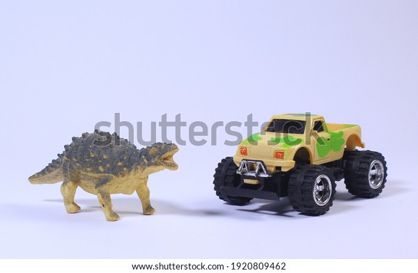 miniature dinosaur and\
adventurous cars