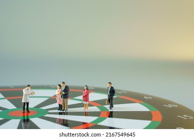 Miniature Doctor And People With Mask On Dartboard.For Annual Health Check Up.