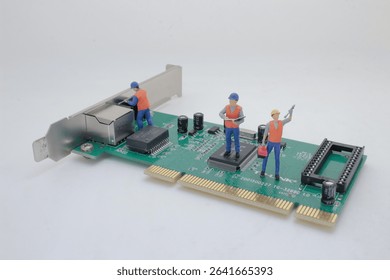 a Miniature figures dressed as construction workers a - Powered by Shutterstock - Get 15% off with code: PIKWIZARD15