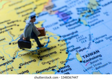 Miniature Figurine Concept : The Businessman Traveling / Standing On MAINLAND CHINA Map Travel Around The World, Business Trip Traveler Adviser Agency Or Online World Wide Marketing Concept.