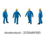 A miniature figurine of a construction worker dressed in a blue jumpsuit isolate on white background with clipping path