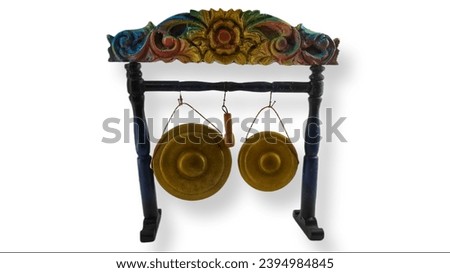 Miniature Gong, a traditional Javanese musical instrument. Miniature Indonesian Javanese Traditional Gamelan Music Instruments in White Isolated Background
