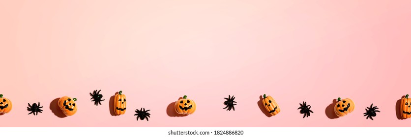 Miniature Halloween pumpkin ghosts and spiders    flat lay