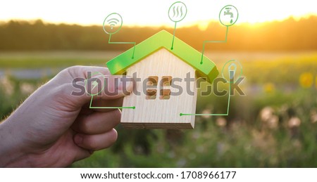 Miniature house and symbols of public utilities. Choosing a home to buy, assessing the cost and condition of the building. Location in the city. Repair and renovation, maintenance services.