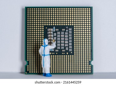 Miniature Lab Worker Checking Silicon Chips. Semiconductor Chips Quality Control Concept.