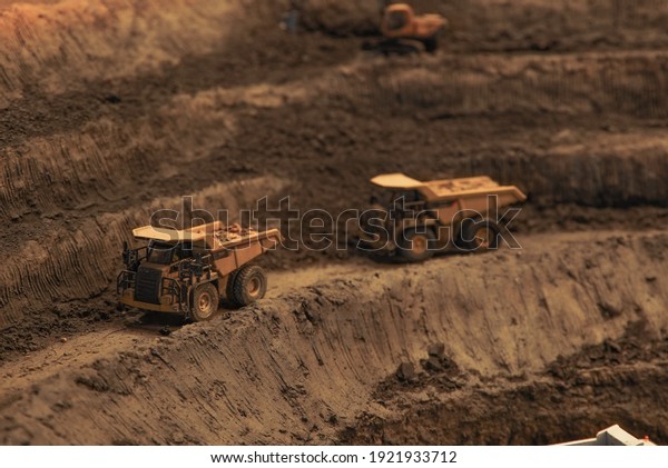 miniature mining with heavy equipment\
transporting mining\
products