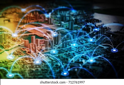 Miniature model city and communication network concept. Internet of Things. Information communication network. abstract mixed media. - Shutterstock ID 712761997