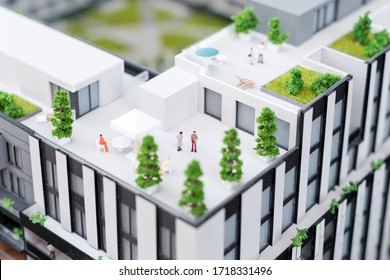 Miniature Model, Miniature Toy Buildings, Cars And People. City Maquette. New Building Project