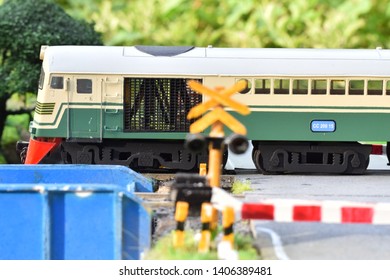 Miniature Model Train With Several Locomotives And Carriages