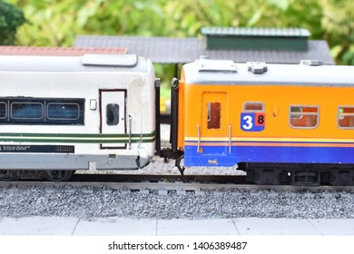 Miniature Model Train With Several Locomotives And Carriages