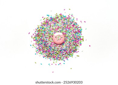 Miniature pastel pink donuts sprinkled with blue green purple pink sprinkles on white background for discount announcement or birthday celebration design or commercial advertisement - Powered by Shutterstock