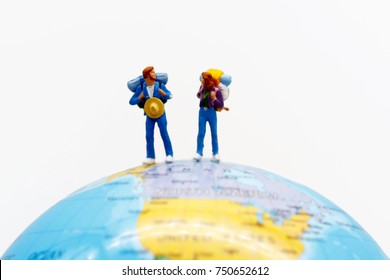 Miniature people, backpackers on the globe walking to destination. travel and business concept.
 - Powered by Shutterstock