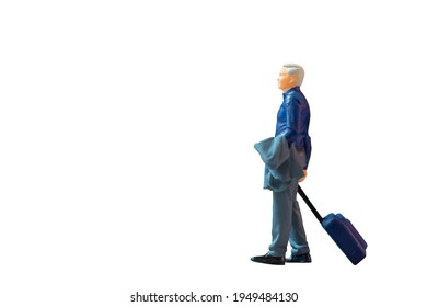 Miniature people Businessman with luggage on white background with clipping path - Powered by Shutterstock