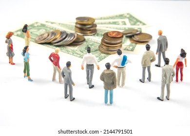 miniature people. businessman stands near dollar money. investments and earnings for work
