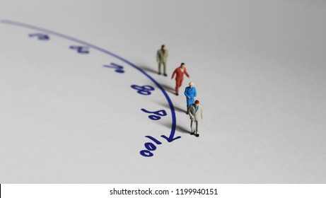 Miniature people and the concept of an aging society. - Shutterstock ID 1199940151