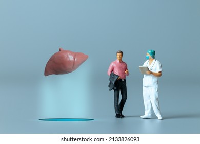Miniature People , Doctor Studying And Treating Human Liver , World Health Day Concept