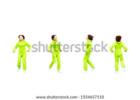 Miniature people figure character as runner in posture isolated on white background.