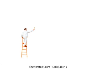 Miniature People With Ladder Holding Brush In Front Of A White Wall Background