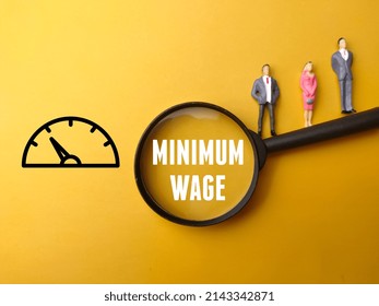 Miniature People, Magnifying Glass And Icon With Text MINIMUM WAGE On Yellow Background.