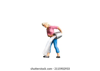 Miniature people Maid or Housewife cleaning isolated on white background with clipping path