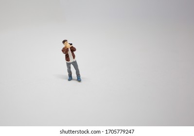 Miniature People : The Male Photographer Is Standing To Shoot