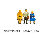 Miniature people office, worker and business sit on chair concept in variety action on white background with space for text