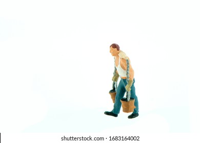 Miniature people office, worker, and farming concept in variety action on white background with space for text - Powered by Shutterstock