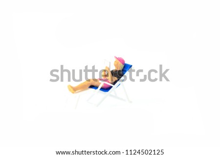 Miniature people office, worker and swimming beach sport concept in variety action on white background 