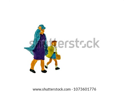 Miniature people office, worker, and traveler concept in variety action on white background with space for text