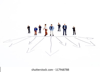 Miniature people on white background - Powered by Shutterstock