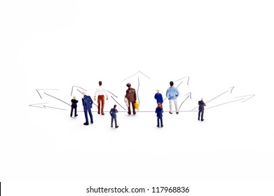 Miniature people on white background - Powered by Shutterstock