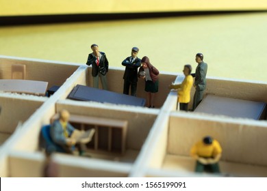 Miniature People Separated In Office Cubicles.Work In A Sterile Office Environment. People Divided In Little Boxes. Personal Space To Complete Your Work. Office Politics, Romance, Or Drama.
