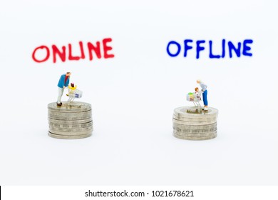 Miniature People : Shoppers For Online And Offline Businesses. Image Use For Retail Business, Marketing Place Concept.