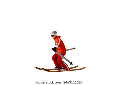 Miniature people , A skier full length Isolated on white background with clipping path - Powered by Shutterstock