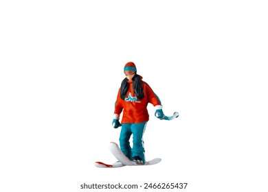 Miniature people , A skier full length Isolated on white background with clipping path - Powered by Shutterstock