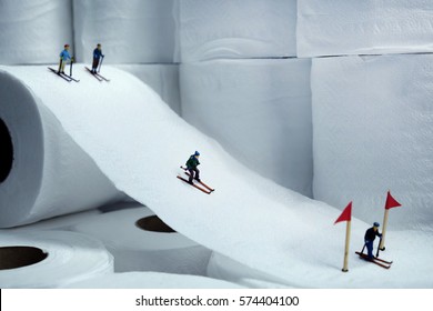 Miniature People Skiing On Tissue