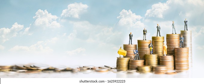 Miniature People Standing On Stack Of Coins. Inequality And Social Class. Income And Economic Inequality Concept. Inequality In Social Class, Ideology, Gender, Racial And Ethnic And Health.