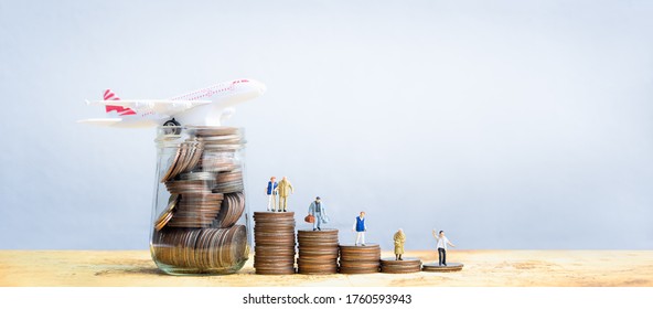 Miniature People Standing On Stack Of Coins. Inequality And Social Class. Income And Economic Inequality Concept. Inequality In Social Class, Ideology, Gender, Racial And Ethnic And Health.