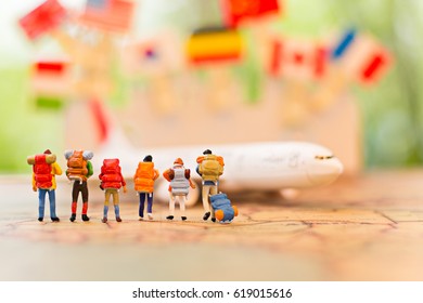 Miniature People, Travel By Plane For Travel. Using As Business Background Concept.