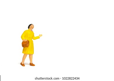 Miniature People ; Traveler Holding A Handbag Standing On White Background , Travel Concept