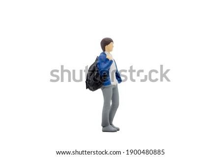 Miniature people traveller standing isolated on white background with clipping path