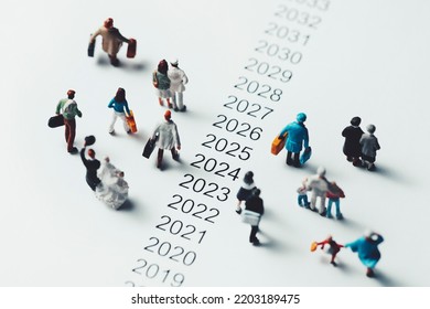 Miniature people walking beside AD - Shutterstock ID 2203189475