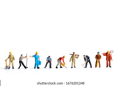 Miniature People ,worker Team Standing On White Background And Copy Space For Your Text , Labour Day Concept