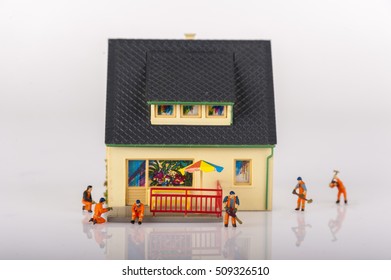 Miniature People Workers And House