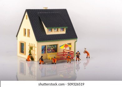 Miniature People Workers And House