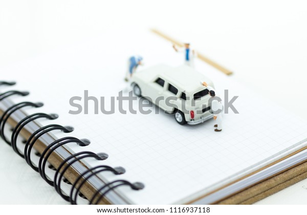 Miniature people :\
Workers make up the car. Image use for cleaning and maintenance,\
business autocar\
concept.